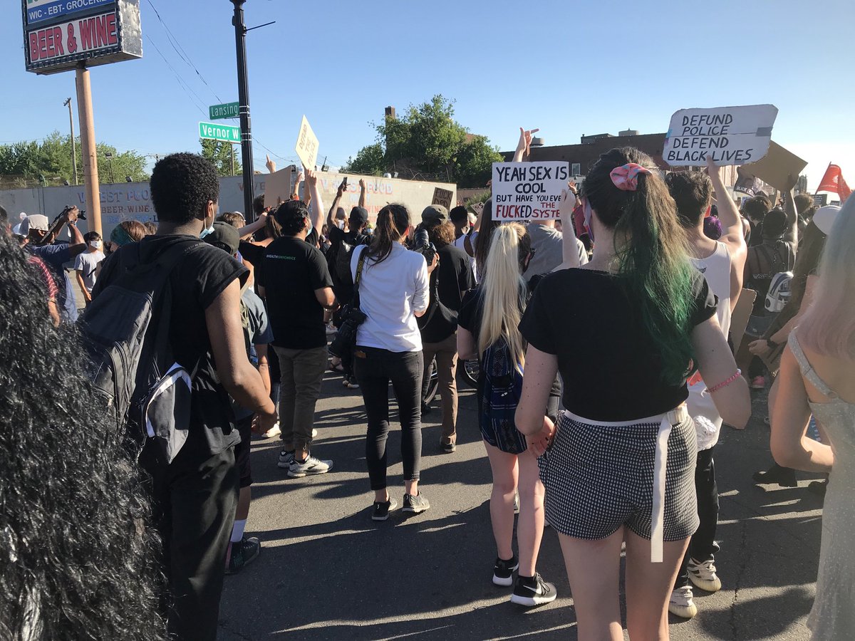 Monday’s protesters in Detroit take a break at Vernor Highway and Lansing Street in SW Detroit, shouting “Black lives matter!” with no police in sight.<a href="/freep/">Detroit Free Press</a>