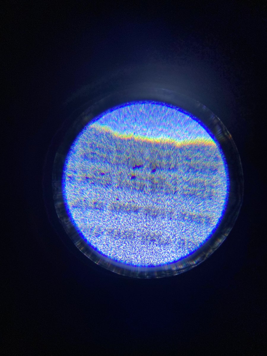 This is a crude attempt, and most of my microscopic dots didn't turn out quite right when looking through my son's hobby microscope, but the slightly larger 1cm dots from the second roll was much easier to read.