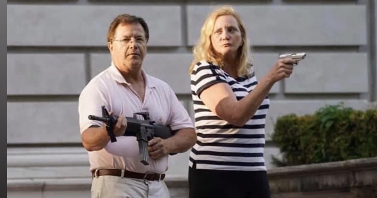 lucky_lambert's tweet photo. New headline- ‘Racist gun toting couple threatens crowd of peaceful protestors, feels the need to make it obvious which one has the bigger dick’ https://t.co/s71orWULZX