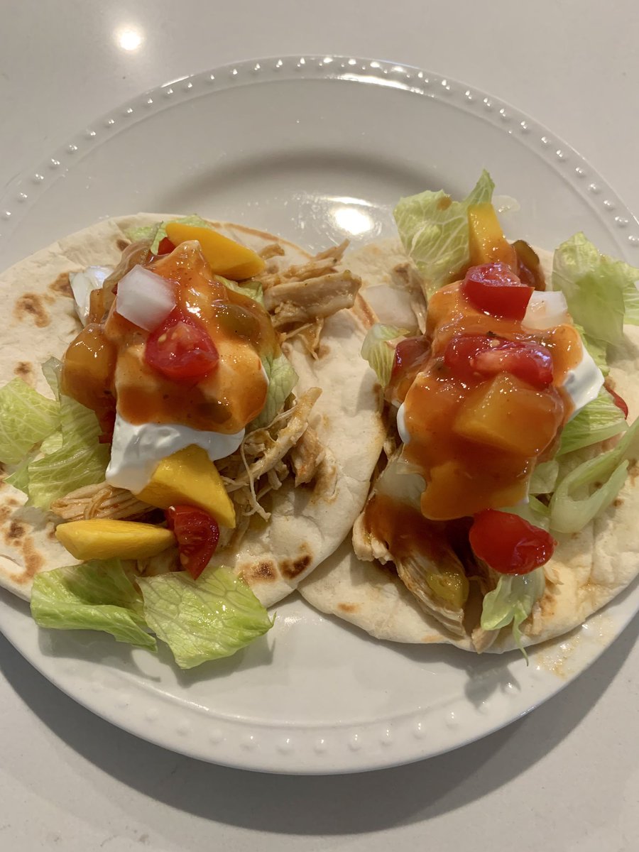 Pulled chicken tacos with mango habanero salsa.🌶