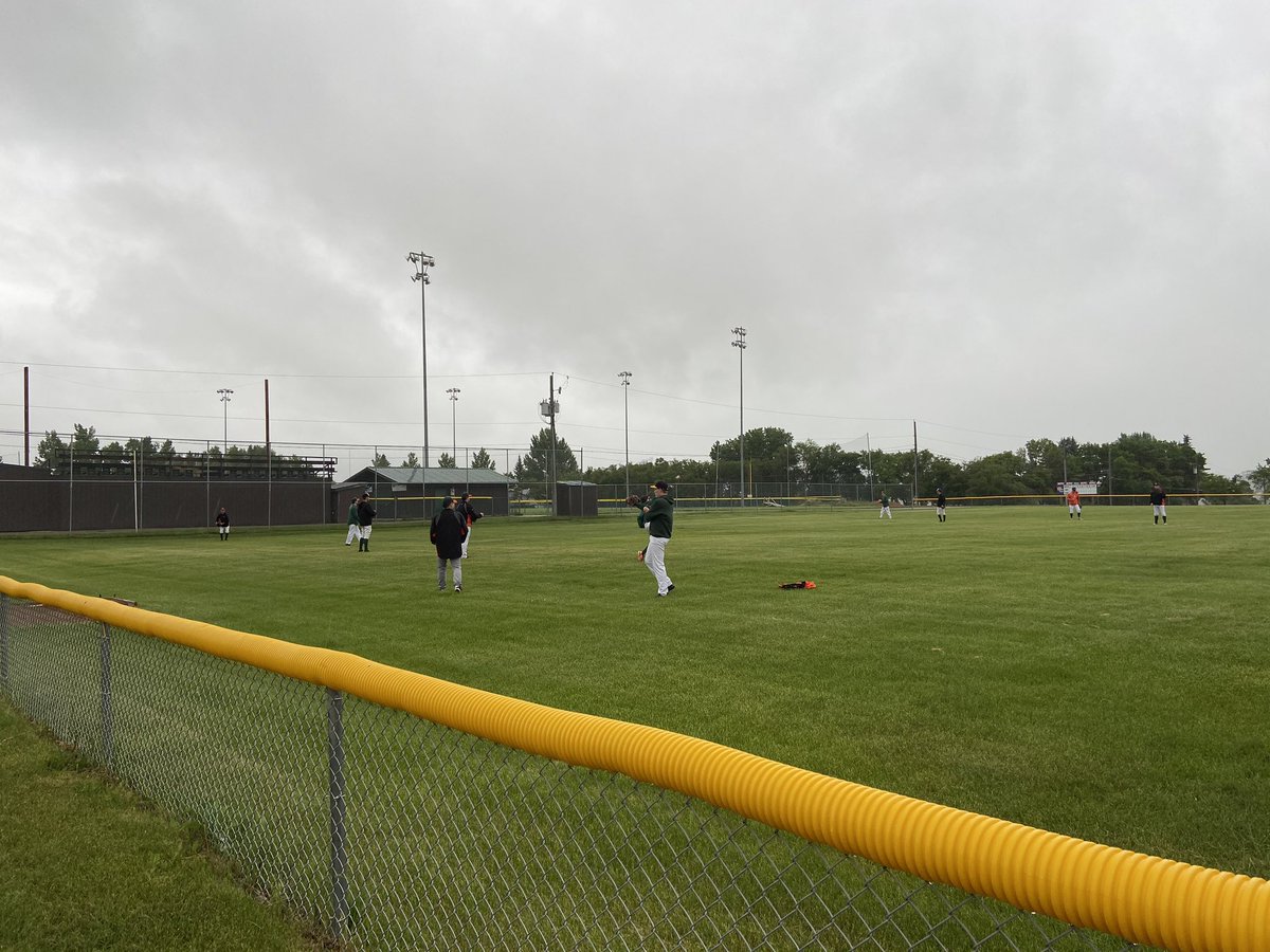 After a long wait to return to the ball diamond the Swift Current U18 were not going to let pouring rain stop them from their first day of practice.