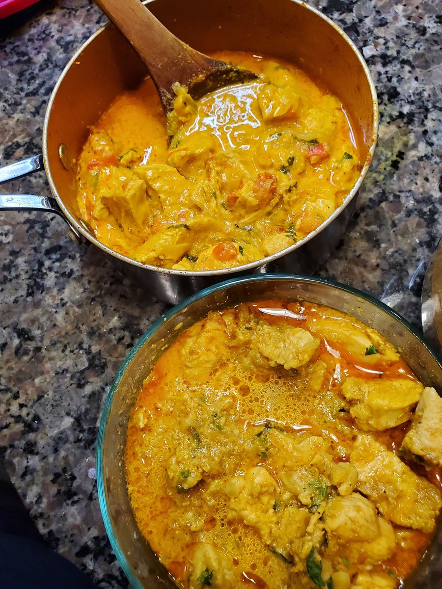 Fun with  . 2 different curries. The one on top is chicken curry with tomatoes and cream. The one at the bottom is chicken with a peanut coconut base. Colors looks the same in the pic but two different tastes. 2/