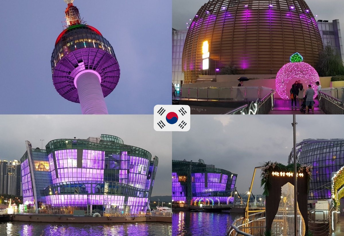 multiple landmarks lit up purple for bts 