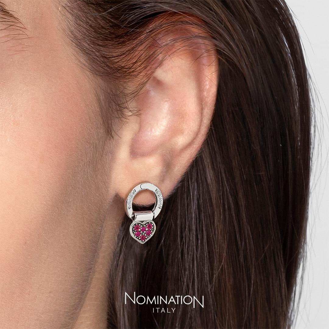 If you wear your heart on your sleeve, try it on your ear instead! This precious sterling silver earring allows you to choose your own sparkling
symbol and message pendants so you can show your true colours - pick your mood from the SEIMIA COLLECTION at <a href="/NominationSland/">NominationSunderland</a>