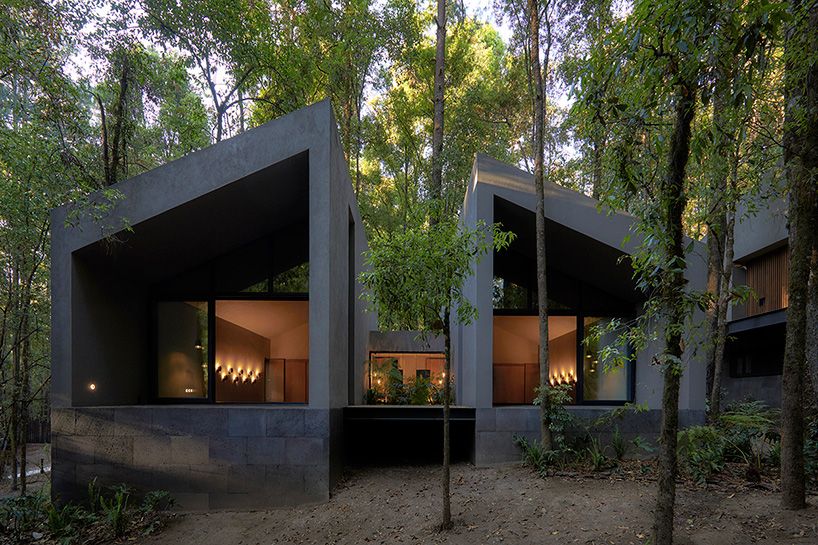 designboom's tweet photo. weber arquitectos builds social cabins with volcanic stone in mexican forest https://t.co/owGj5s1AMl https://t.co/xbk1t4PrPE