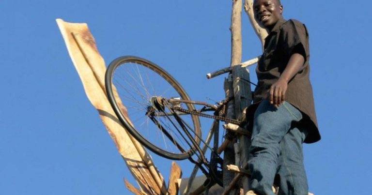 Malawi's William Kamkwamba provided electricity for his village with windmills built from scrap at age 13 in 2001.He dropped out of school over the failure to pay fees & read a library book about windmills.He built a water pump & 2 wind turbines for his people in his village.