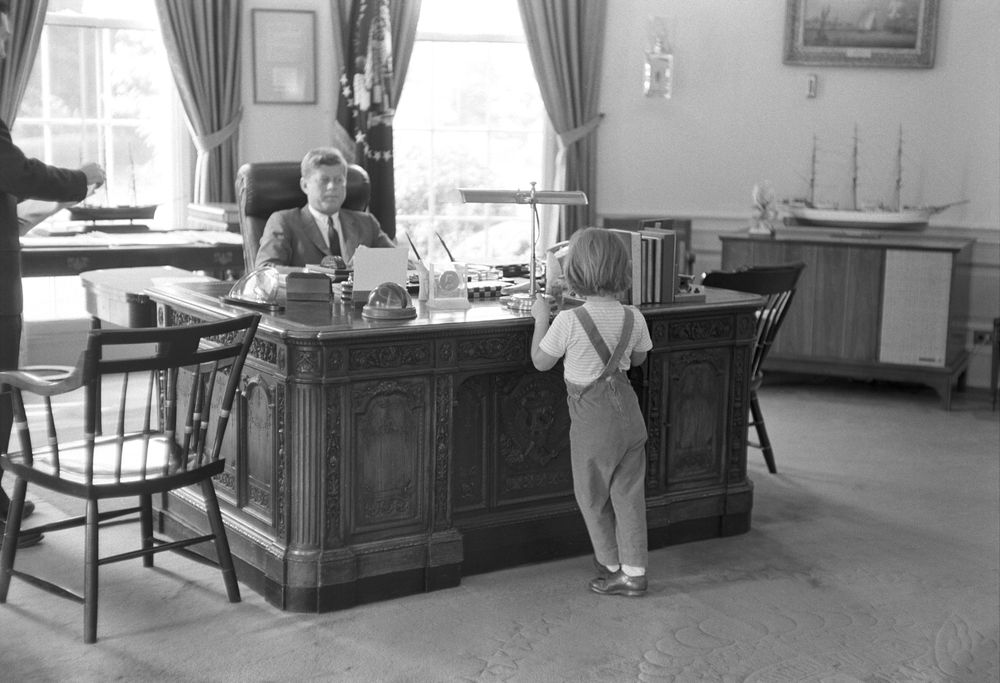 The Resolute desk was placed in the oval office for the 1st time in 1961, per the request of JFK. Jackie found the desk in the broadcasting room and moved it to the oval office during her White House restoration project. https://www.biography.com/news/jacqueline-kennedy-white-house-restoration