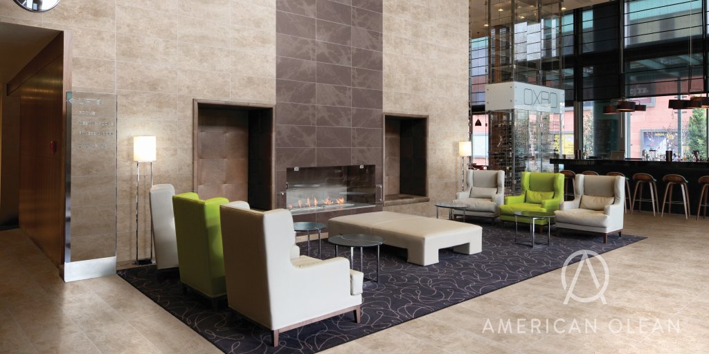 aonews's tweet photo. On this #TileTuesday, we're marveling at how different looks of #tile can set the mood - like the elegance of #marble with calming #limestone for a space that's both refined &amp; inviting. #americanolean

📷 Candora in Earnest Beige (wall and floor) &amp; Sincere Brown (above fireplace) https://t.co/zzDm8Hdm8s