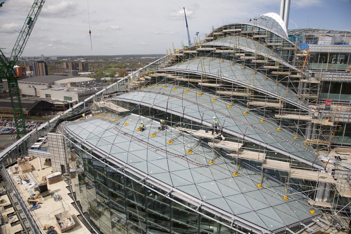 Len_Grant's tweet photo. After the steel, the glazing... #OneAngelSquare @BAMConstructUK #Len30 @PeterSlateBAM @JaneMonaghanBAM @andreasingh78 @gedflanagan @adeblackie All part of my new book: https://t.co/r5mFJRuNcR https://t.co/ZGfilFwf7f