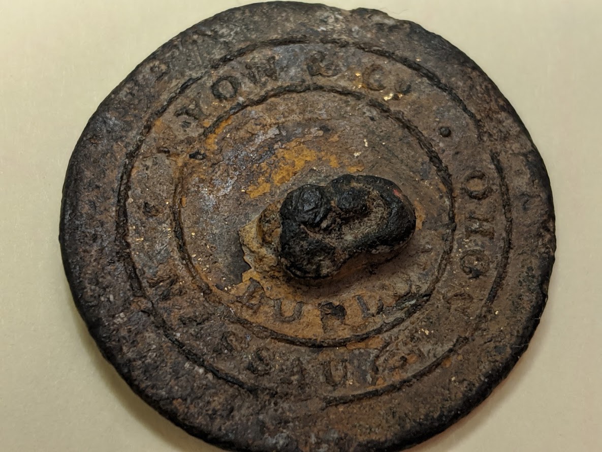 Found this #oldbutton today. Can anyone help me identify/age it please? So far have worked out it says Nassau St, Soho and it appears to have been gilded once #find #treasurefind #metaldetecting #liverybutton