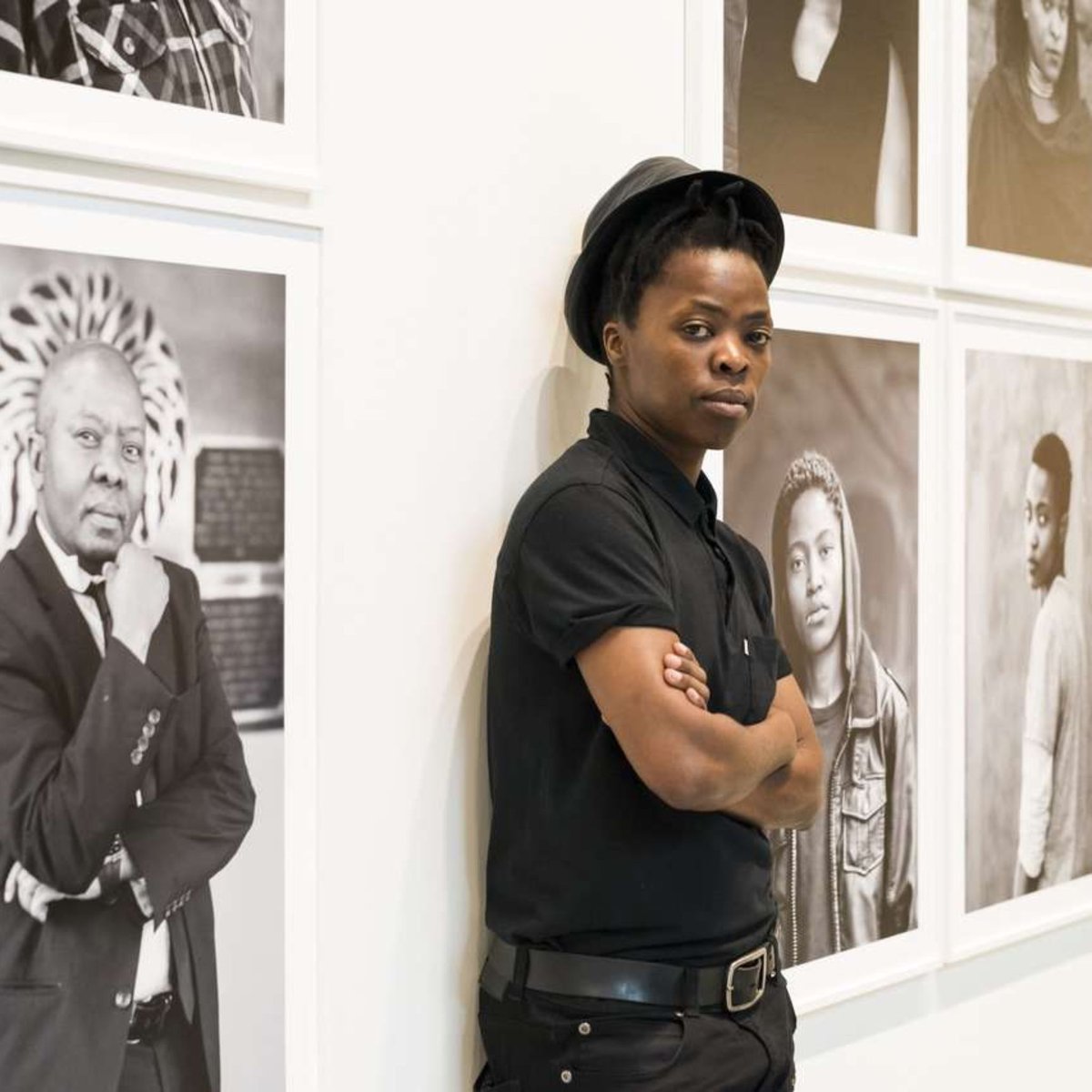 Zanele Muholi identifies as a visual activist. Their work investigates the severe disconnection between the equality promoted by post-apartheid constitution of South Africa and the ongoing bigotry and violent acts targeting individuals within the LGBTQ+ community.