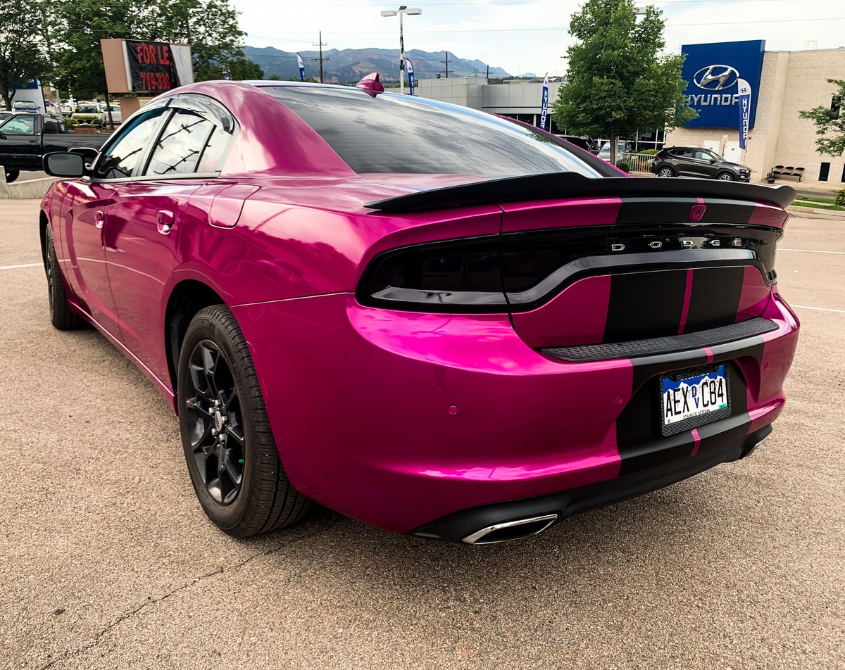 DriveInAuto's tweet image. Wow, it's the final look of the fuschia wrap! These racing stripes really give this Dodge Charger a polished, head turning look! Installed by our Motor City location.
