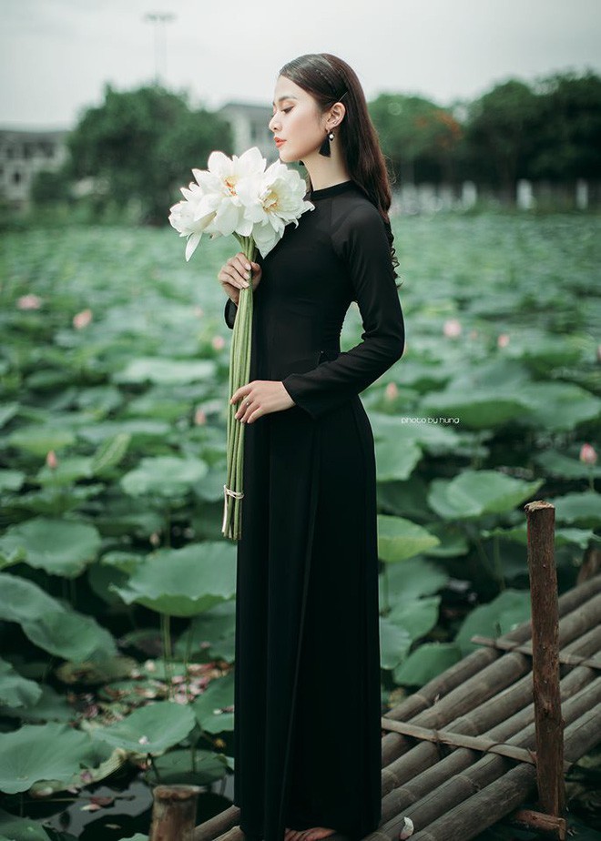 In this photoshoot by Mạnh Hùng, the conventional white is replaced with black.