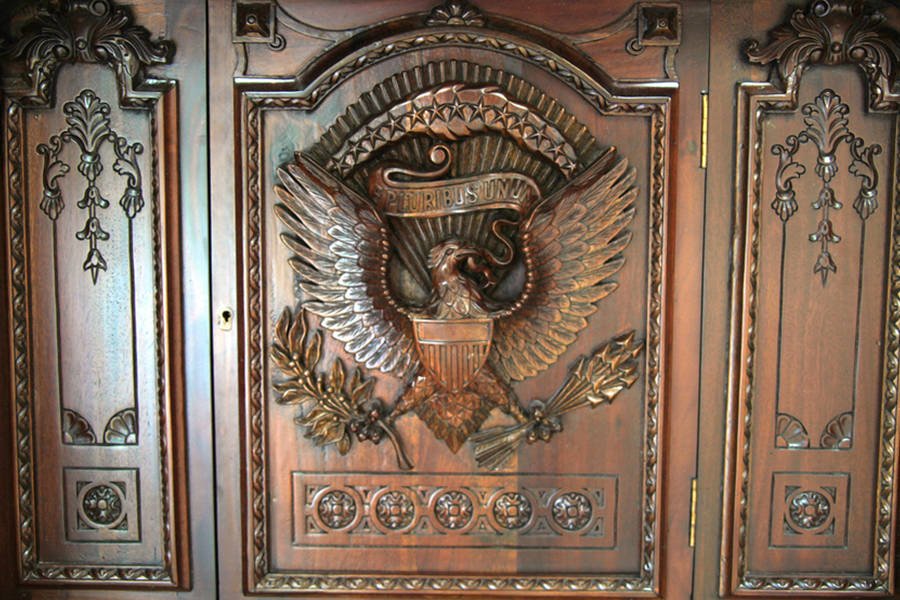 Presidential seal was updated in 1945. The eagle was changed back to face the olive branches instead of the arrows.  http://greatseal.com/sightings/resolutedesk.html
