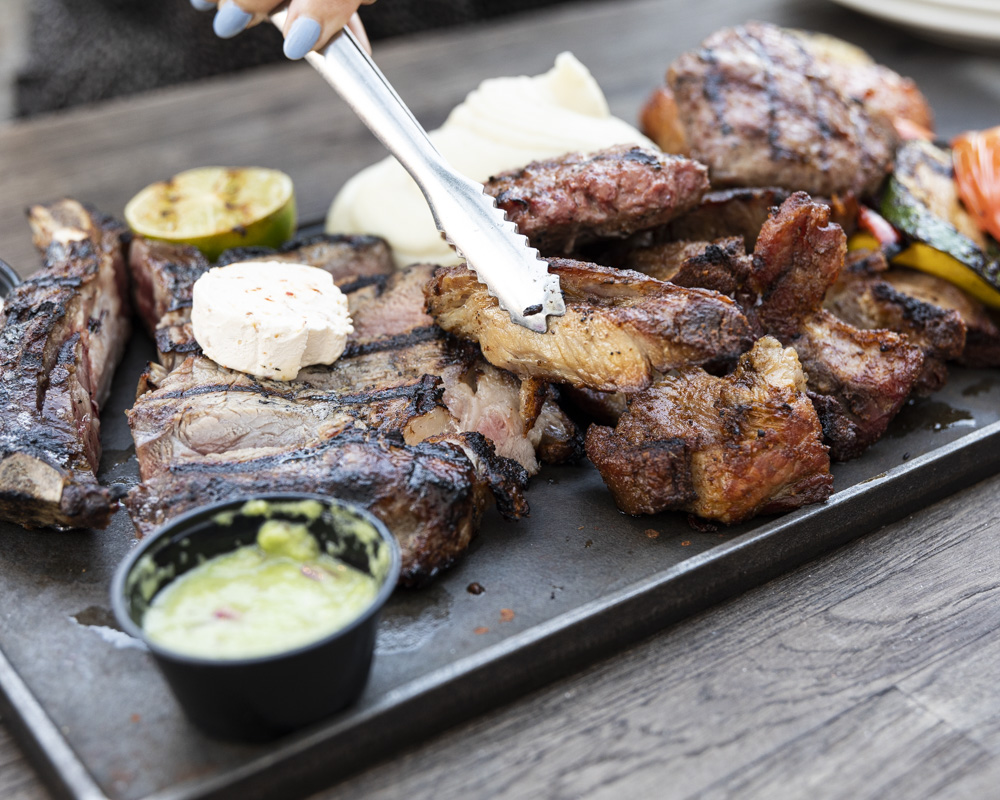 Have you dared to order the Meat Mountain yet? Piled high and accompanied by pureed Yukon potatoes and charred veggies for good measure. This serves two so Grab a friend and meet us on the Lavender Sidewalk! Enjoy your feast al fresco.