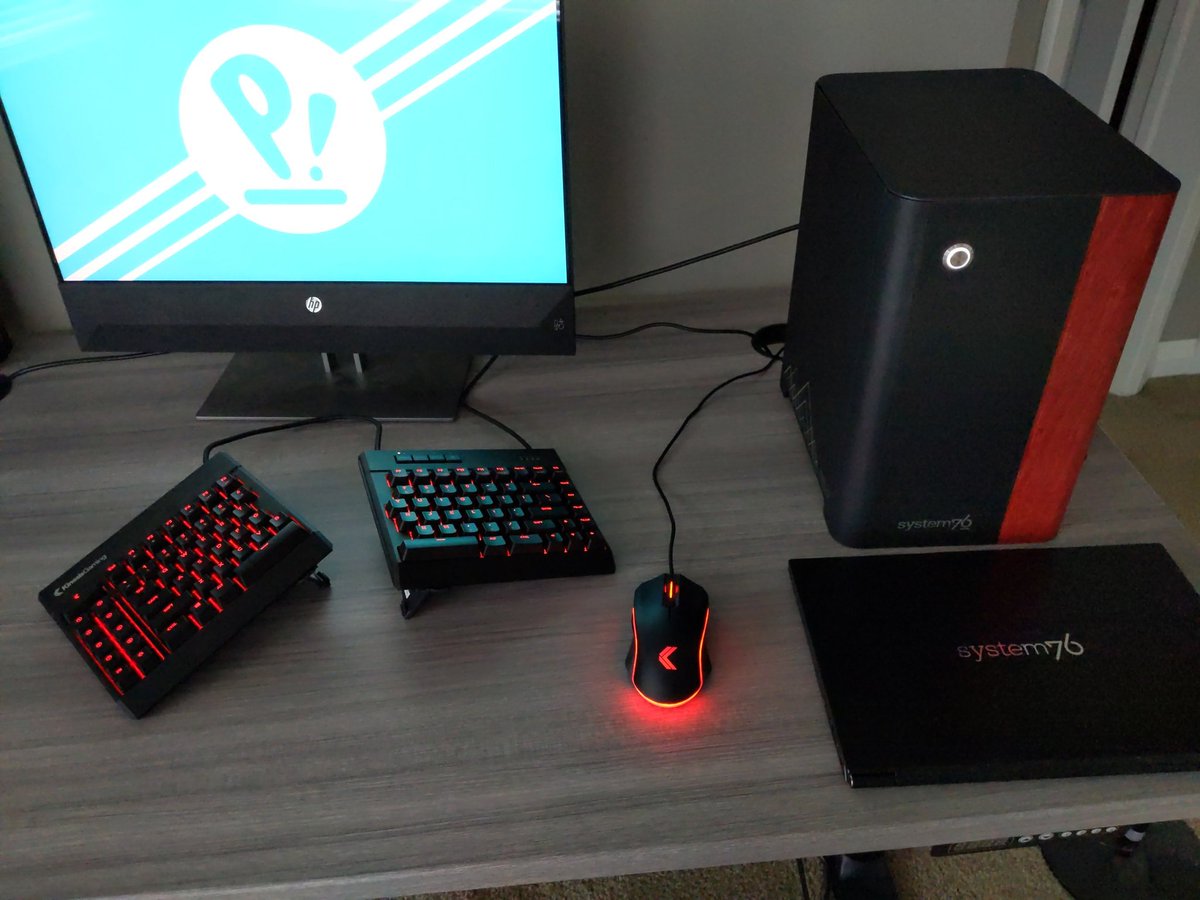 system76's tweet image. Laptop, desktop and OS. Yep, seems to be all there. 

#customerphoto #Thelio #popos #lemurpro #red