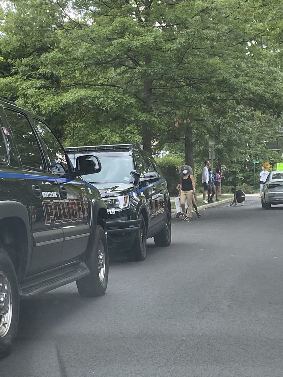 Allegedly a rock, stone or brick was thrown. People are standing around asking for more information. Some are frustrated by the police presence in the first place. 3 Cops cars total, one blocking traffic from a main street.