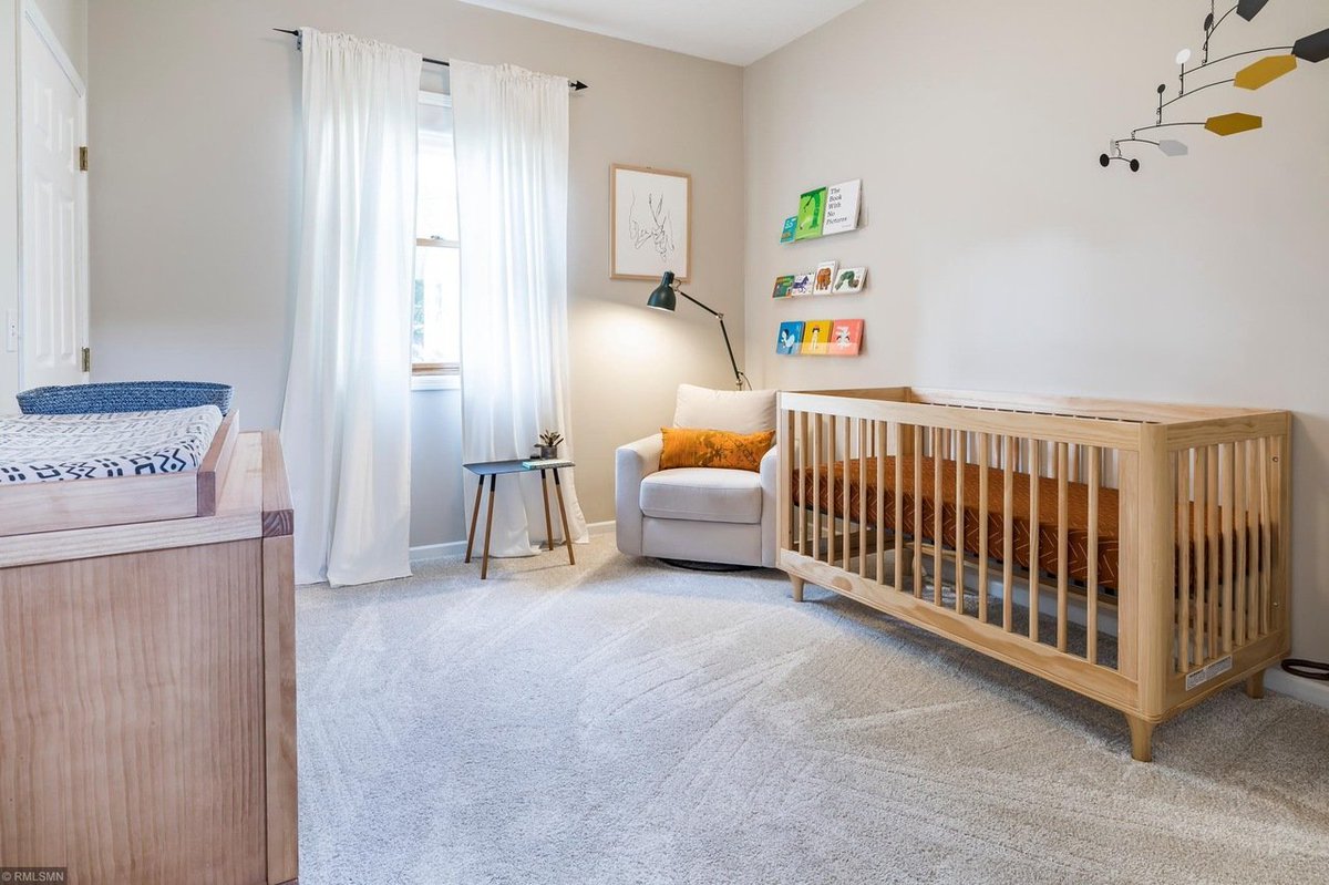 Jane: (opens door) the first bedr-Heather: ohhh my gosh this is so cute!!!! Tim: Wow, perfect for a nursery. Heather: I can definitely see myself rocking our little baby to sleep in that chair by the window. Tim: pretty good size, too.