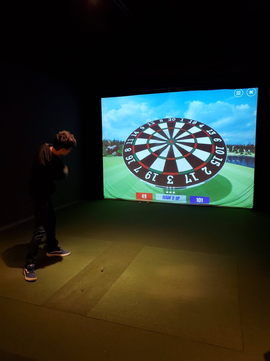 eliyochim's tweet photo. We were going to play outside today but got rained out. Good thing I know a guy that could get us in at @evolution_golf. 😉 The boys love playing @aboutGOLF_ darts! #yeg #yeggolf #indoorgolf #virtualgolf #evolutiongolf https://t.co/C5UbSoMnUz
