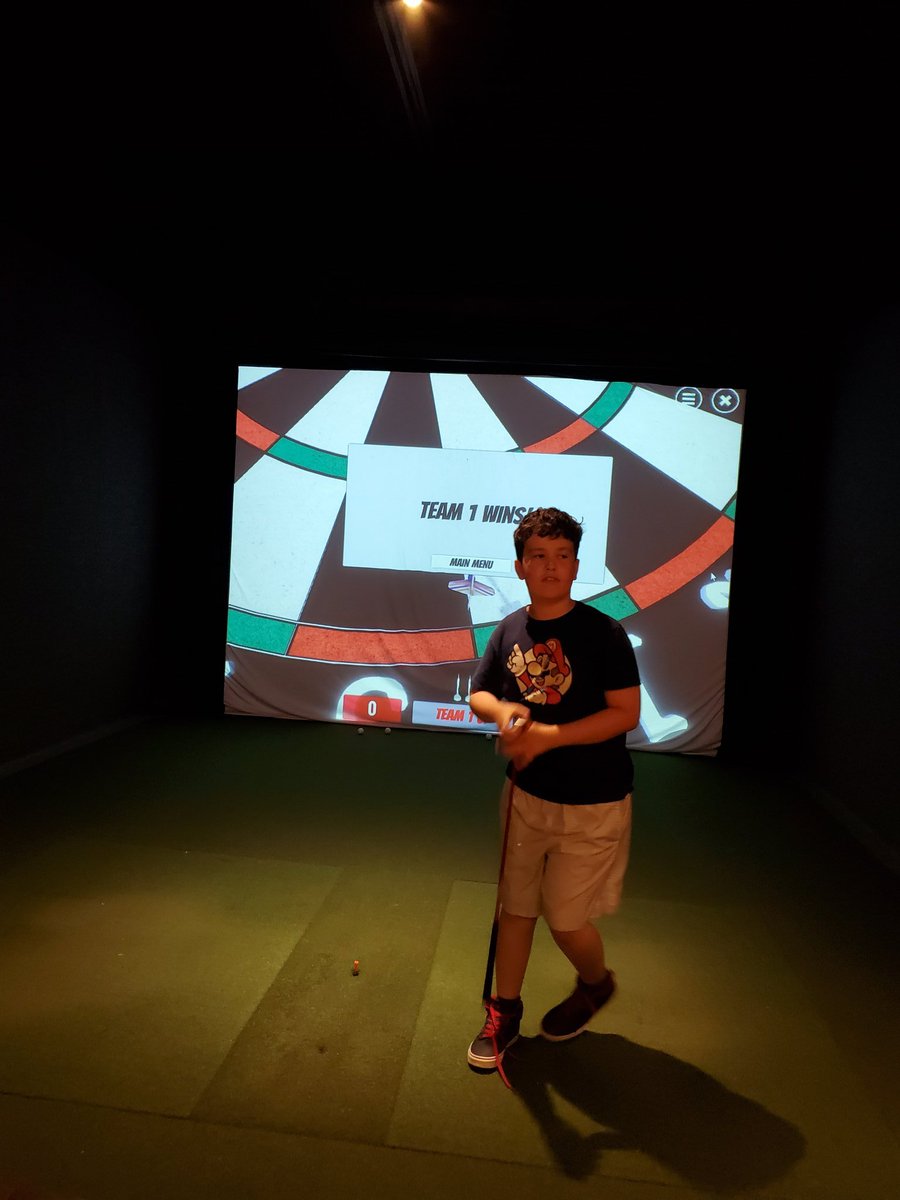 eliyochim's tweet photo. We were going to play outside today but got rained out. Good thing I know a guy that could get us in at @evolution_golf. 😉 The boys love playing @aboutGOLF_ darts! #yeg #yeggolf #indoorgolf #virtualgolf #evolutiongolf https://t.co/C5UbSoMnUz