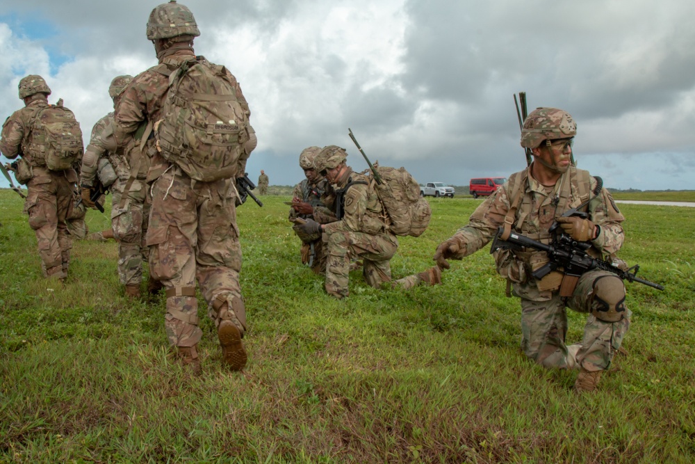 USPACOM's tweet photo. Paratroopers assigned to @USARPAC @25thID, @USArmyAlaska, conduct a Joint Forcible Entry Operation #JFEO jump into Andersen Air Force Base, Guam. #AirborneBrigade #ArmyStrong #FreeandOpenIndoPacific. https://t.co/2Nx8P6fpUL