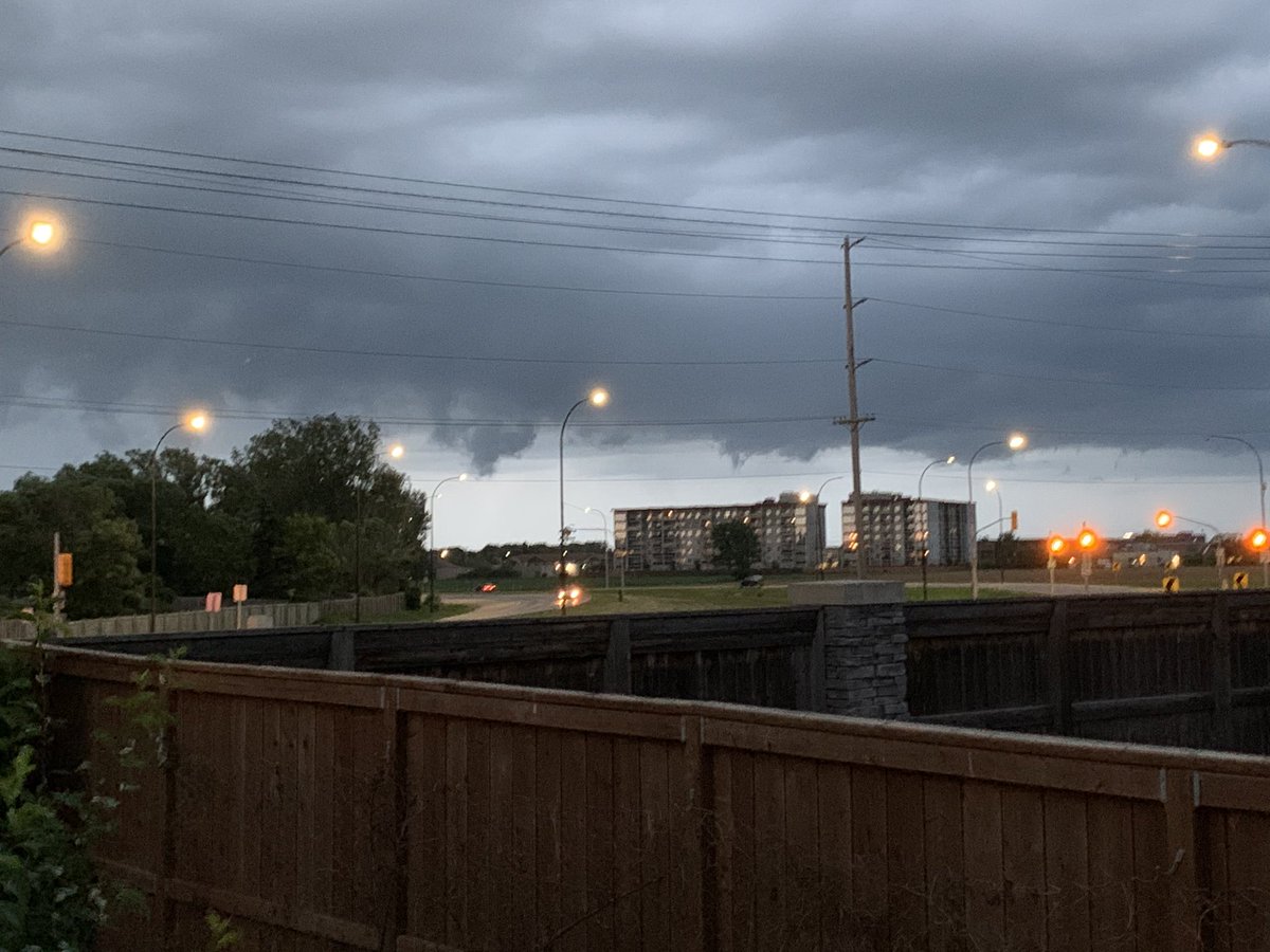 ChiangRichard's tweet photo. Pictures don’t do it justice but are these weak funnel clouds over SE Wpg? @IWeatherMB #mbstorm @weathernetwork https://t.co/16EgO4GlR4