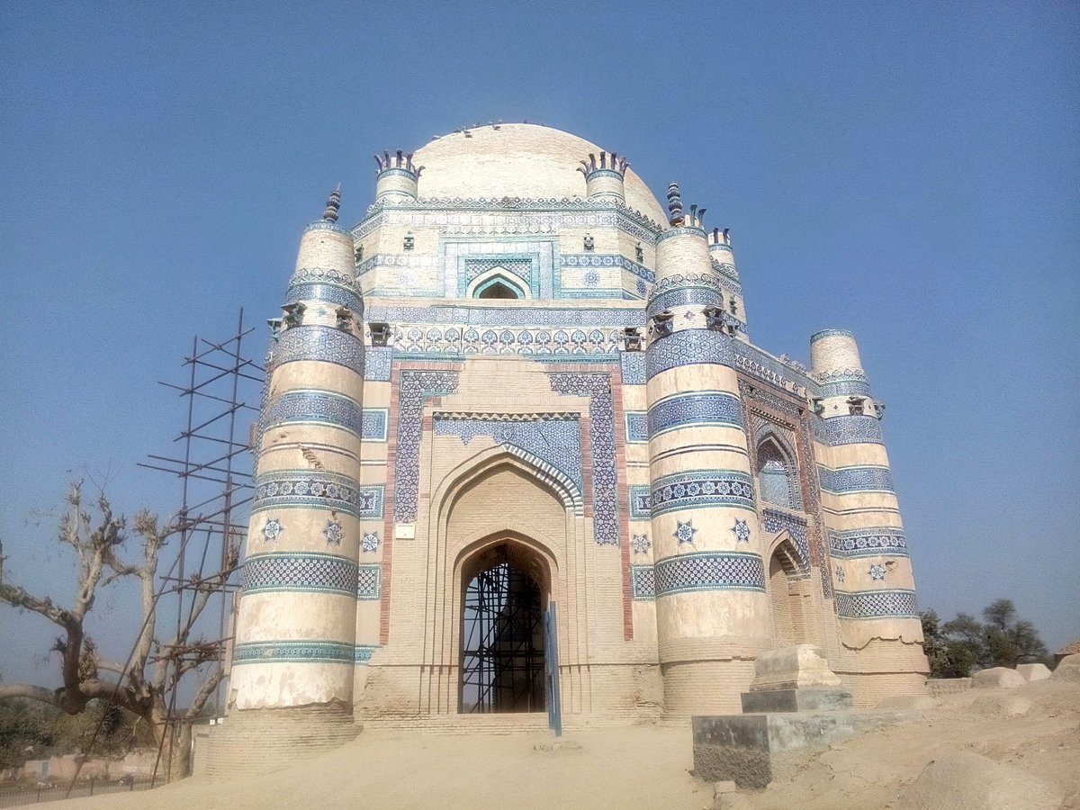 This magnificent fired brick structure stands on an octagonal base with turrets decorating each cornerAnother narrower octagonal drum rises above the turrets that has arched windows on each sideAtop this drum an imposing dome is raised