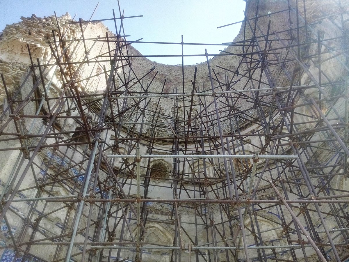 What once was the western façade of this magnificent structure is completely gone, with it the burial chamberA spider web of infinite iron scaffolding intimidates a present day visitorThere was once financial aid from World Monument Fund, New York for preserving Uch Monuments