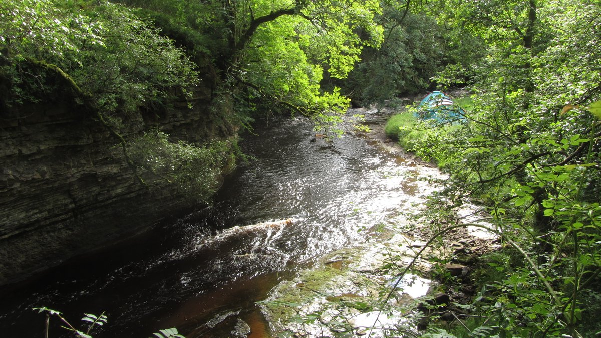 Day 5) Padon Hill to Greenlee LoughThis was a day of rain-sun-rain-sun, dozens of stiles, feeling dog-tired, taking gear on & off, angry cattle diverting me off-course, and a bare-foot river crossing. I stopped briefly to admire a gorge at Warks Burn and promised to return.