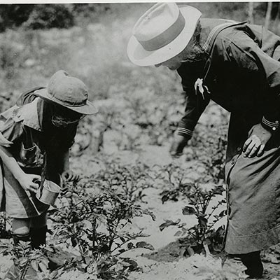 How does your garden grow? Future First Lady Lou Hoover was active in <a href="/girlscouts/">Girl Scouts</a> most of her adult life- helping with the Girl Scout farm in 1918.