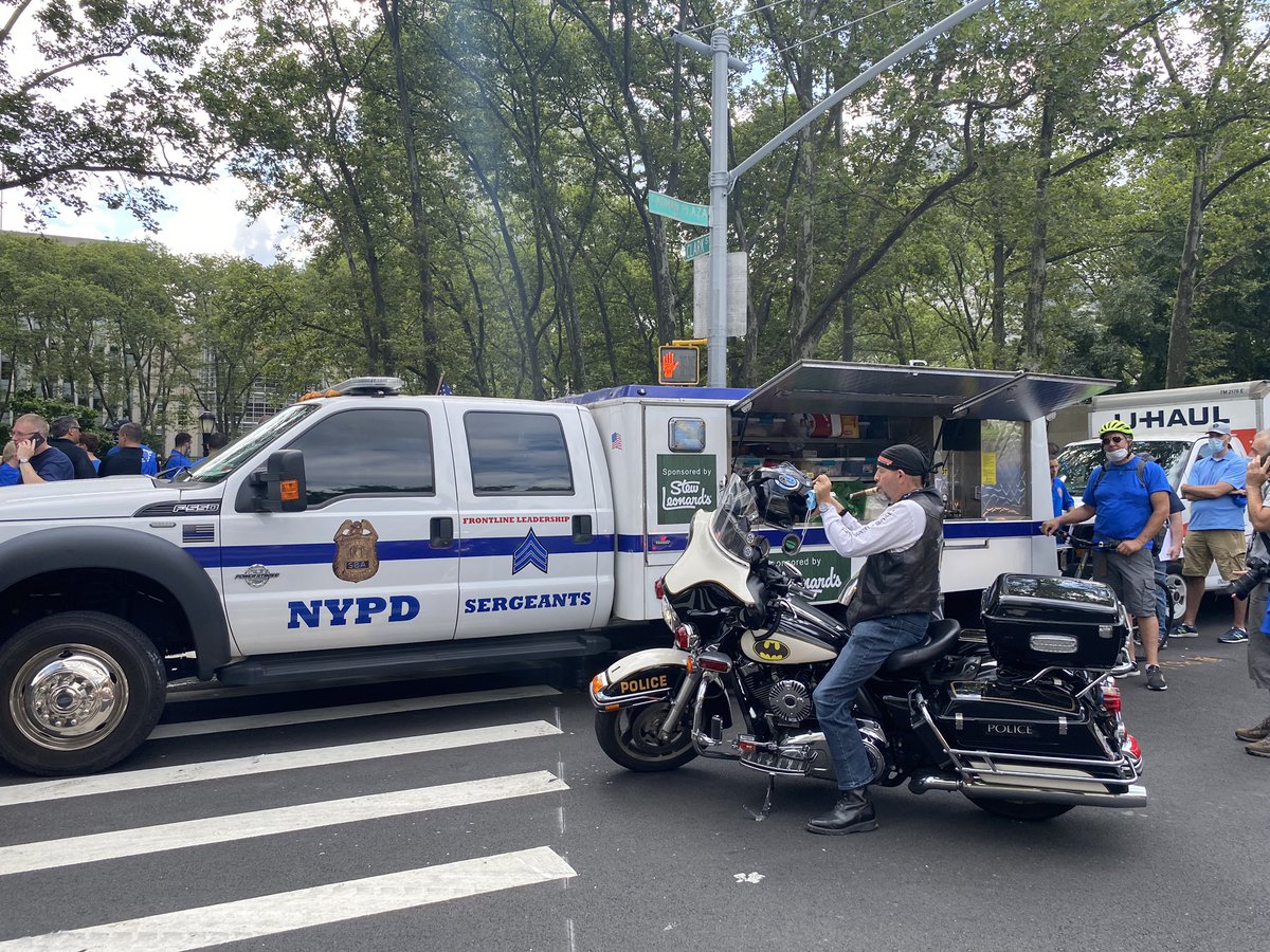 A few hundred law enforcement supporters have joined religious groups for a march toward City Hall. Many seem to be current or former NYPD