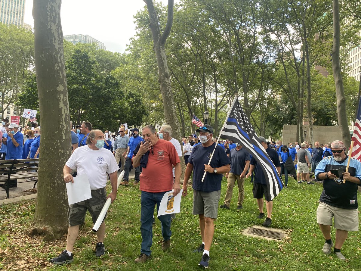 A few hundred law enforcement supporters have joined religious groups for a march toward City Hall. Many seem to be current or former NYPD