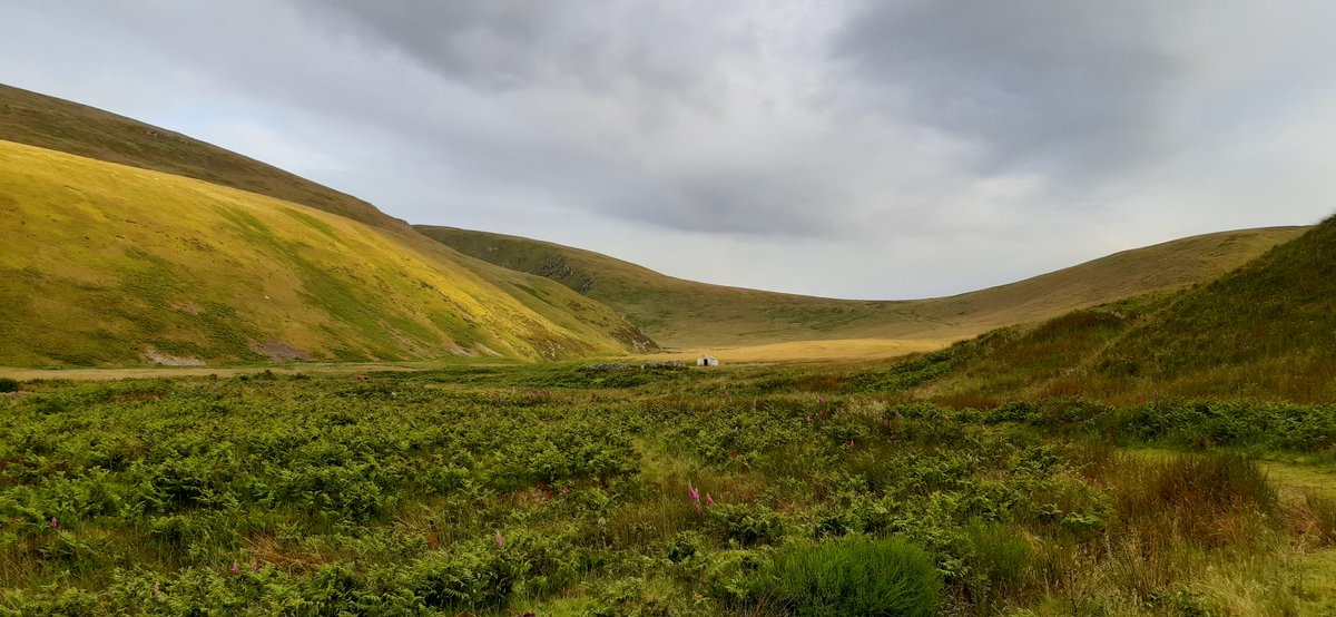 Day 2) cont: After a wet afternoon, I arrived at my Shangri-La for the night, the head of the College Valley, and was greeted by a hint of a rainbow above the craggy Hen Hole that I would investigate the following morning.