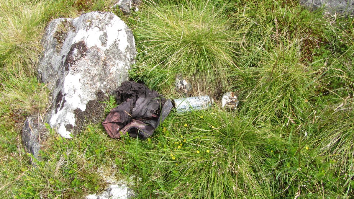 Day 4) cont: Views of the Catcleugh Reservoir were spoilt by the gross remains of a BBQ and soggy clothing. Despite the extra weight on a middle-aged back and virus concerns, I bagged it up and took it down to Byrness.