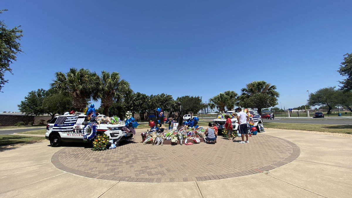 Families continue to visit the memorial for Officer Edelmiro Garza and Ismael Chavez at the McAllen Police Department. 
#McAllenStrong 💙🖤💙