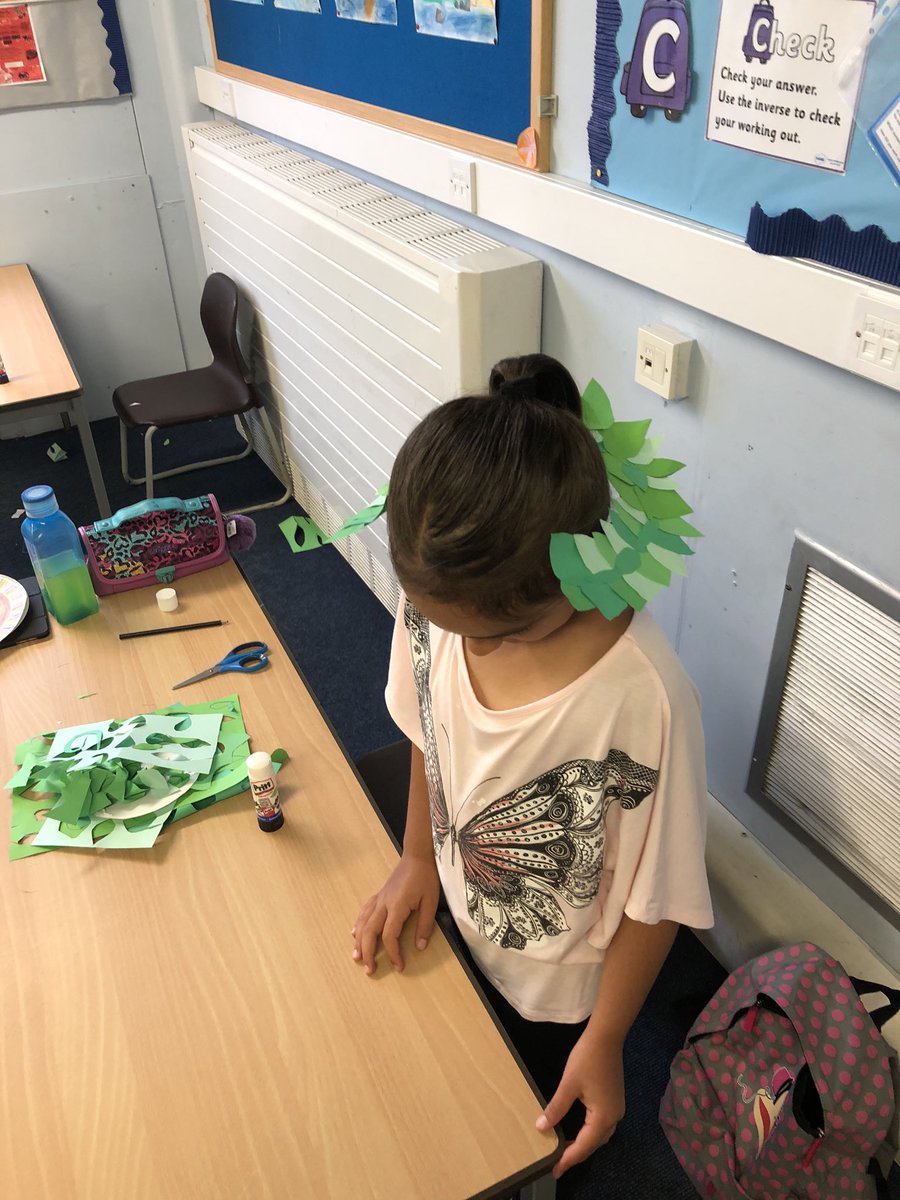 Hendrefoilan's tweet photo. The first day of our Greek Olympics went well with winners receiving their handmade laurel wreaths. #hdfpy4 https://t.co/1gObk7zG2p