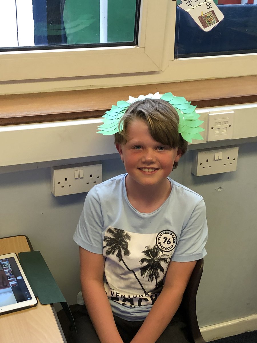 Hendrefoilan's tweet photo. The first day of our Greek Olympics went well with winners receiving their handmade laurel wreaths. #hdfpy4 https://t.co/1gObk7zG2p