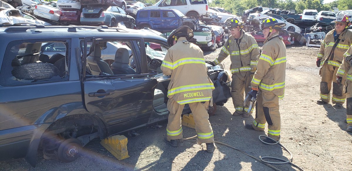 IowaCityFire's tweet photo. Annual auto extrication training at Ace Auto Recyclers. A huge thank you to Joel McCaw for providing #ICFD the location and resources for us to keep our extrication skills sharp. #autoextrication #autorecyclers https://t.co/3Swxmkfipz