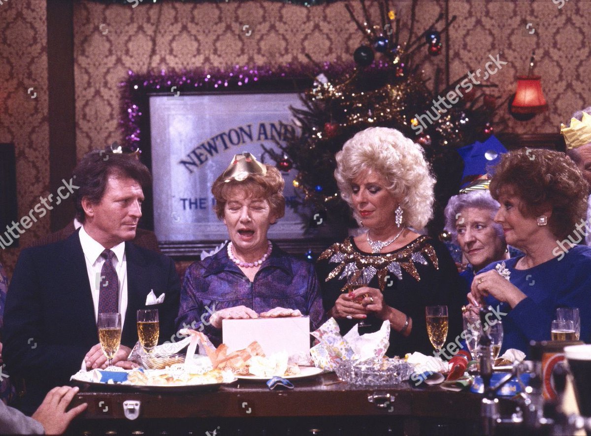 corrieweekly's tweet photo. Hilda Ogden’s leaving party Christmas 1987. 
Pictured: Johnny Briggs (Mike Baldwin) Jean Alexander (Hilda Ogden) Julie Goodyear (Bet Gilroy) Jill Summers (Phyllis Pearce) and Barbara Knox (Rita Fairclough) #Corrie #CorrieClassics https://t.co/aprMmOShAu