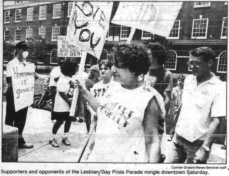 VoicesOutLoudTN's tweet photo. Supporters and opponents of the Lesbian/Gay Pride Parade mingle downtown Saturday. From the Knoxville News Sentinel, 1991 in our history of #KnoxPride collection https://t.co/vCGqk73EVf