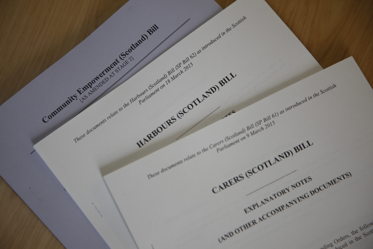 'Bills' are proposed laws that are being examined by the Scottish Parliament. Members of the Scottish Parliament (MSPs) discuss them to decide if they should become law. The public also usually gets the chance to share its views. 👥
