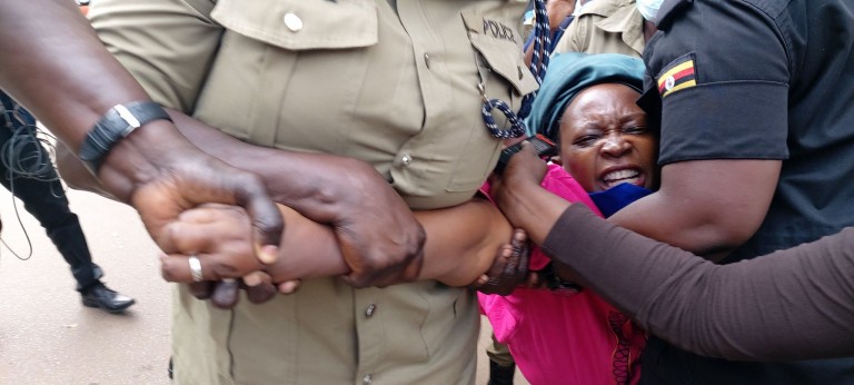 SharingUbuntu's tweet photo. Stella Nyanzi brutally arrested AGAIN! This time for protesting the extrajudicial killing of a Makerere University student by a paramilitary group. #Justice4Tegu https://t.co/fhQI7v3UGl