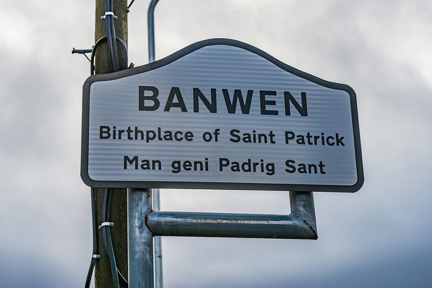 Born Maewyn Succat (Maewyn: Welsh for devoted friend; Succat: Pagan for warlike), in Bannavem Taberniae (now Banwen), the teenage Patrick (or Padraig) was captured and sold into slavery with "many thousands of people" by a group of Irish marauders that raided his family estate.