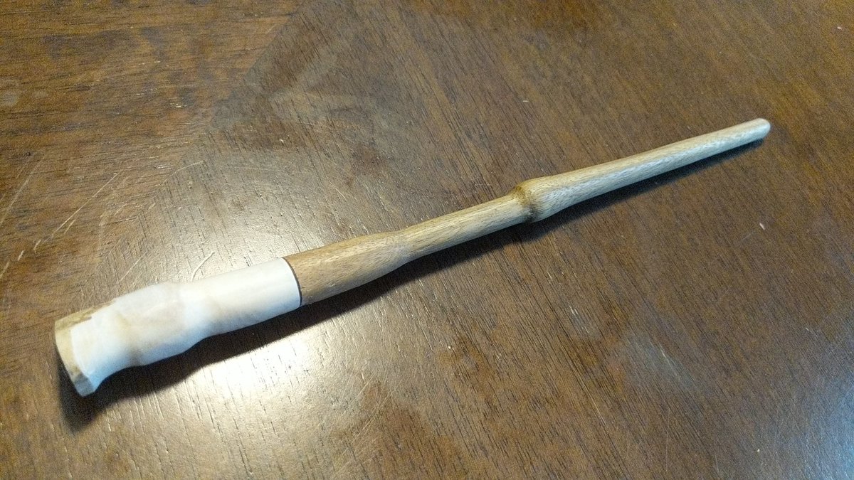 Everyone like wands don't they?

Ipe wood fused with elk antler (humanely harvested). 10 1/4 inches, unyielding.