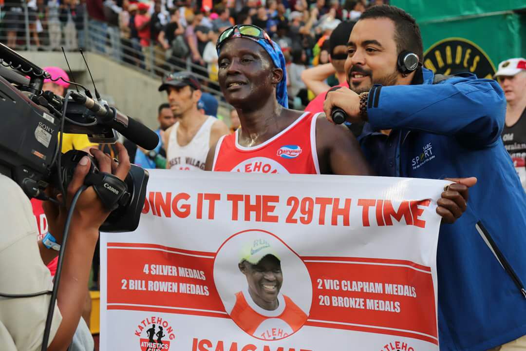 Hloni01's tweet photo. Join us this Sunday to run 10km Isaac Mabula Appreciation. Katlehong Athletics Club is celebrating its legendary runner who completed 30 consecutive Comrades Marathons. Run and post pictures on our social media platforms #comrades #katlehongrunning #katlehong #CityofEkurhuleni https://t.co/0Opx5C7Yuj