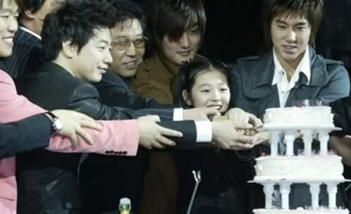 cut a cake with actual dbsk kings as a 10 year old