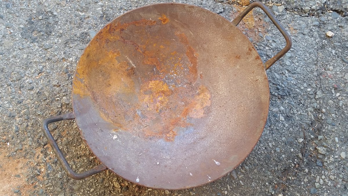 My brother gave me a rusty old wok he found in the trash, so I guess I'll try to make it nice again
