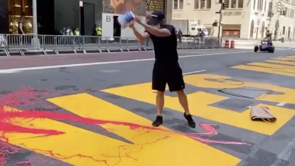 thehill's tweet image. Vandal dumps red paint on Black Lives Matter mural in front of Trump Tower, then runs off hill.cm/04QMd5k