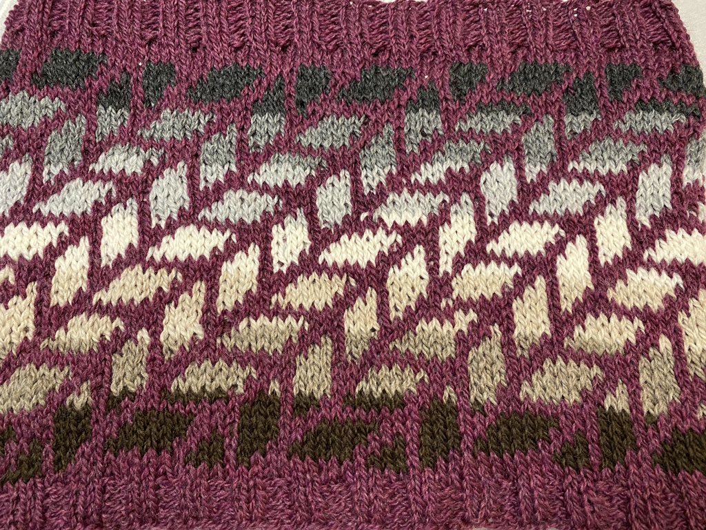 My Taniko Cowl is finished. I used the Kumara motif &amp; ❤️ how the purple (Blue Sky Fiber Woolstok in Pressed Grapes) makes the neutrals (mini hank bundle) pop. The bundle will make 3 of these cowls with only 1 skein of the main color. This will definitely get a lot of wear!