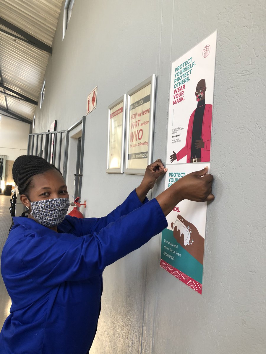 HazyviewDLC's tweet photo. A big Thank You to #HazyviewCampus cleaners Fikile and Clemencia who in the past weeks have mastered pasting posters on the walls. Wash your hands and wear a mask, you heard the ladies. @GwfOnline https://t.co/BuN1J6Y1OY